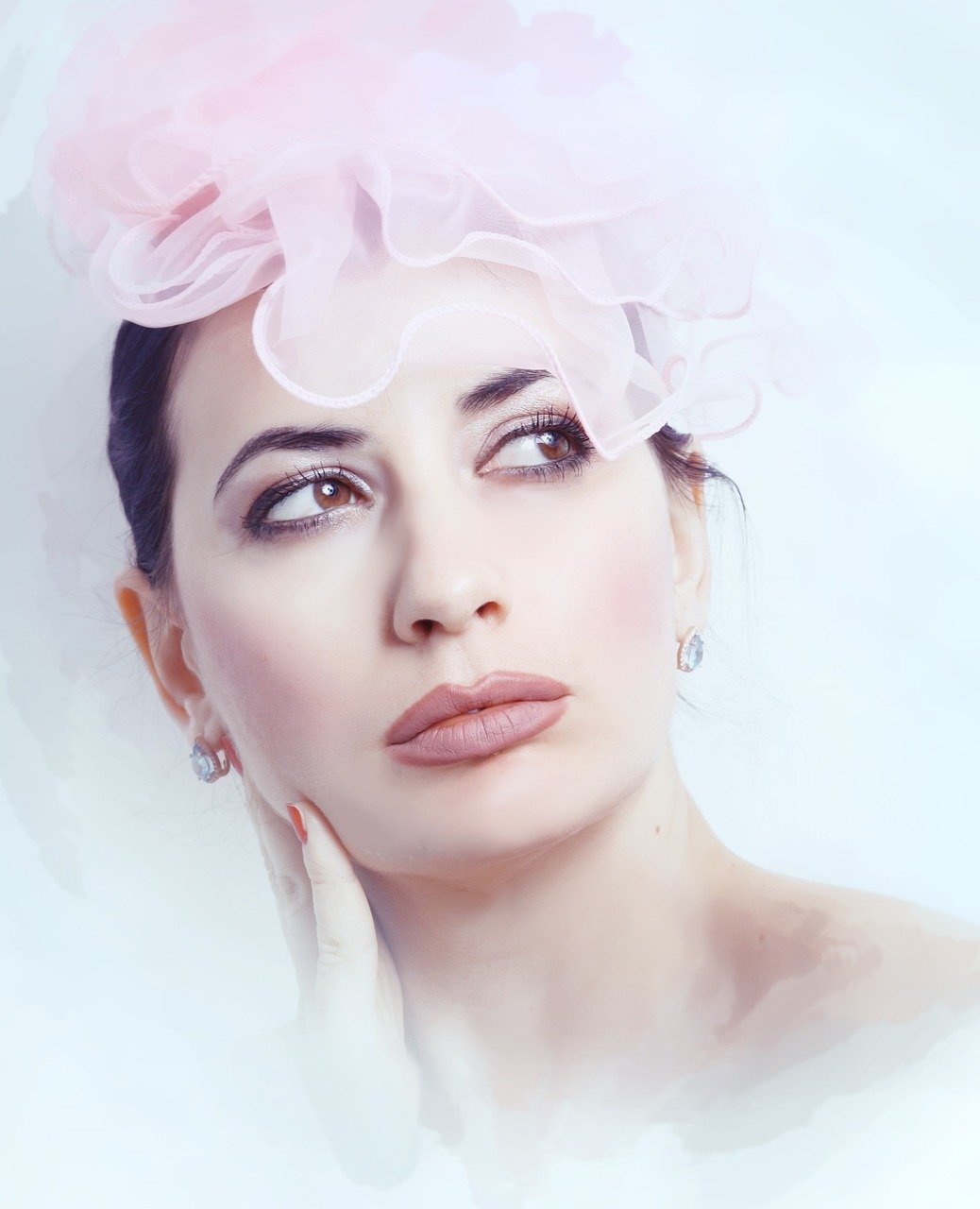 Specialist performing non-surgical face lifting treatment at Hues Aesthetic Clinic Madurai