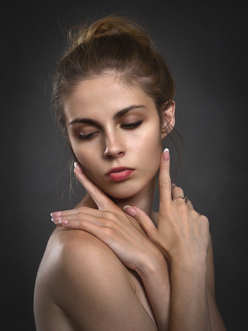 Specialist performing diamond-tip microdermabrasion skin exfoliation treatment at Hues Aesthetic Clinic Madurai